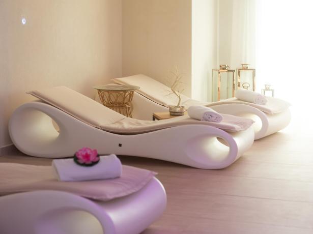 Modern loungers in a bright, relaxing spa setting.